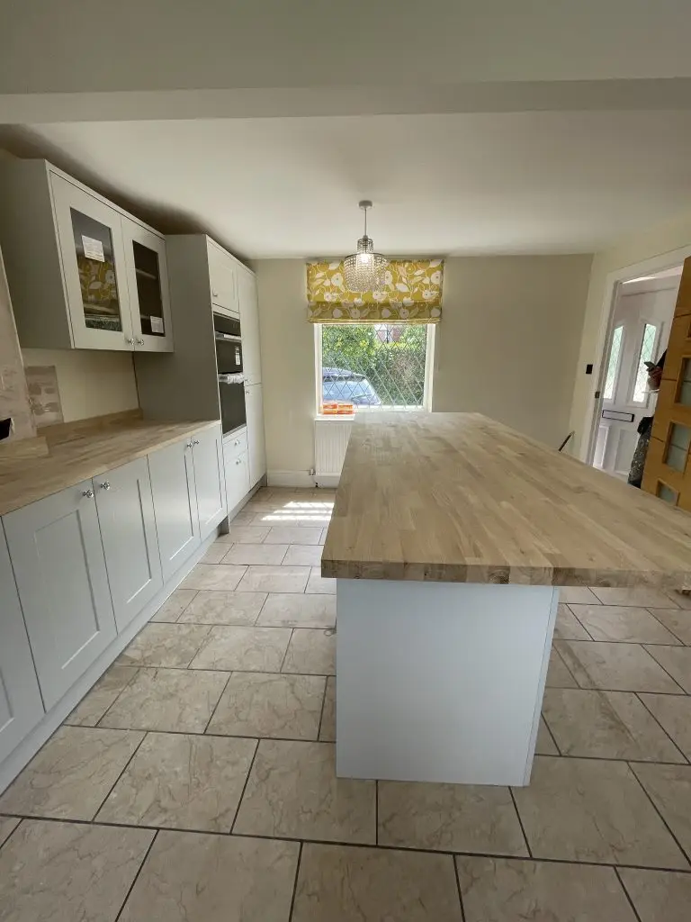 Kitchen fitting project with wooden worktop by Studio Wood Interiors